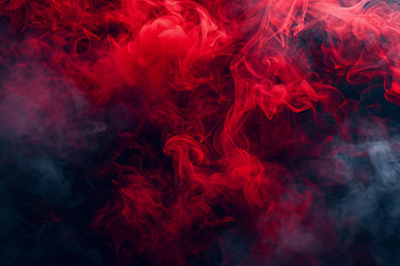 Red and black smoke on a black isolated background. Background from the smoke of vapeの素材