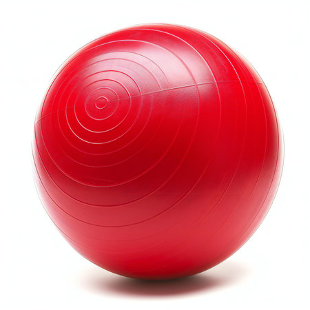 Red fitness ball isolated on white background.の素材