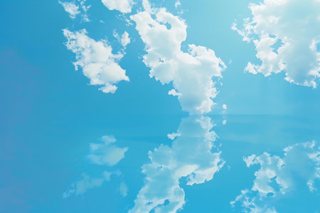 Blue sky background with white cloudsの素材