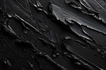 black paint brush strokes on a black background close-up macro photographyの素材