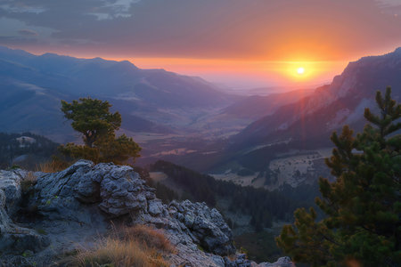 Sunset in the mountains. Sunrise in the mountains. Beautiful landscape.の素材