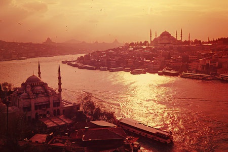 Sunset over the Golden Horn of Istanbul, Turkey. Filtered image processed vintage effect.の素材