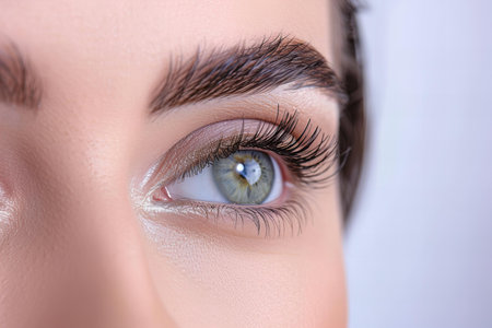 Beautiful woman's eye with long eyelashes, close-upの写真素材