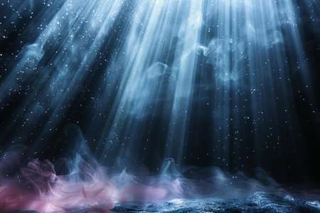 abstract scene with smoke and rays of light on dark blue backgroundの写真素材