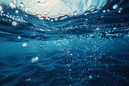 Underwater scene with bubbles and water waves. Underwater background.の写真素材