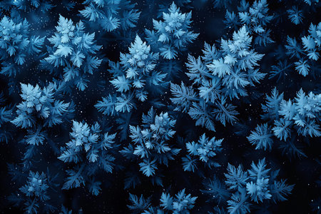 abstract winter background with snowflakes and blue toned imageの写真素材
