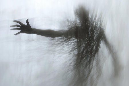 abstract image of a man's hand in a foggy forest