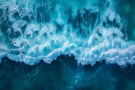 Turquoise ocean waves with white foam. Aerial drone photo.
