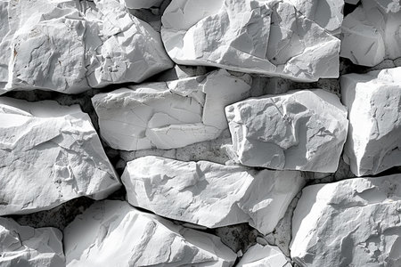 Background of white stone wall texture. Close-up. Monochrome.