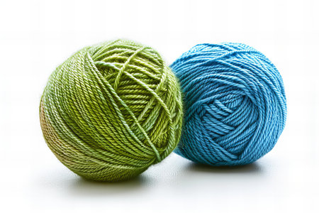 Two balls of yarn for knitting on a white background close-up