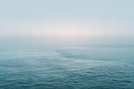 Sunset over the sea in a foggy day. Toned.の写真素材