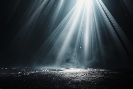 Dark street, wet asphalt, reflections of rays in the water. Abstract dark backgroundの写真素材