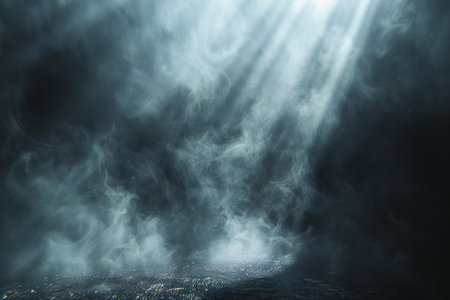 abstract dark background with smoke and rays of light from the topの写真素材