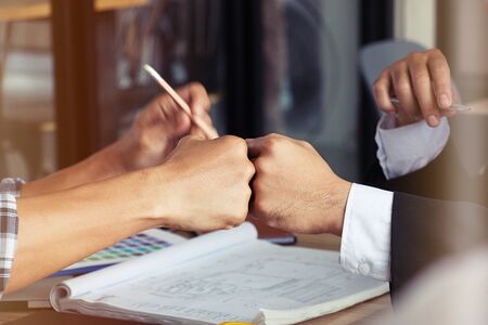 Businessman is giving sign of partnershipの写真素材