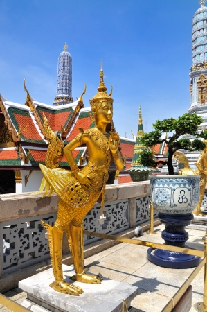 A Golden Kinnari statue att he Temple of the Emerald Buddha  Wat Phra Kaew  , Bangkok, Thailandの写真素材