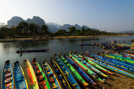 Many boats with Song river in Vang Vieng, Laosの写真素材