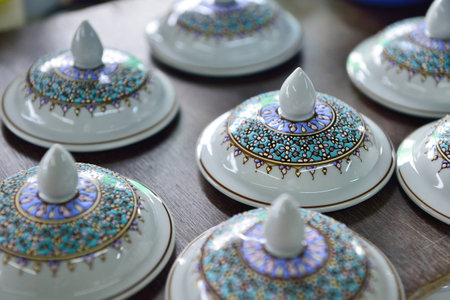 Thai people working process paint Ceramic Benjarong is traditional Thai five basic colors style potteryの写真素材