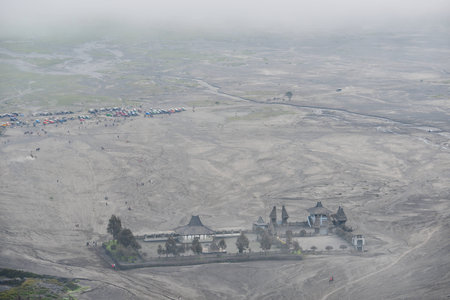 Hindu temple (Pura Luhur Poten) was shot from Mount Bromo, Java island, Indonesiaの写真素材