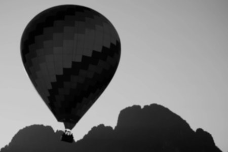 Blur balloon with mountain backgroundの写真素材