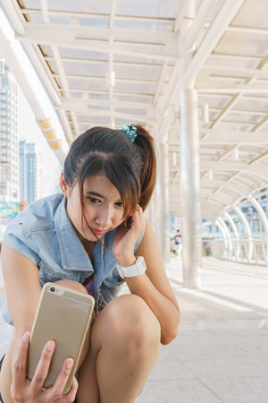 Selfie Pretty girl taking fun selfportrait in Bangkok, Thailandの写真素材