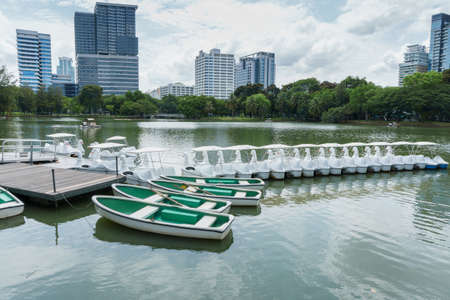renting boat for rowing in public park Bangkok Thailandの写真素材