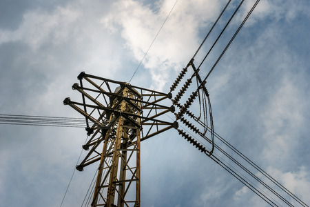 high voltage electricity post junction with sky background