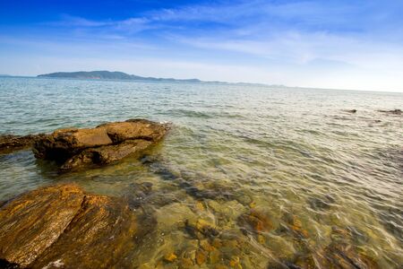 Beatiful sea sky on the rocksの写真素材