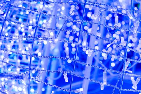 Blue Ornamental lights with bokeh backgroundの写真素材