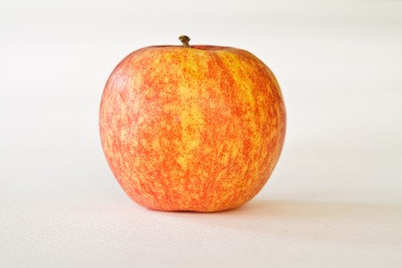 Red apple isolated on whiteの写真素材