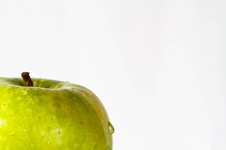 green Apple isolated on white with shadowの写真素材