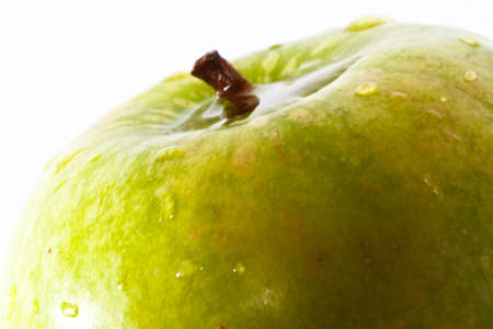 green Apple isolated on white with shadowの写真素材
