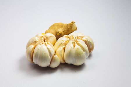 Garlic and ginger  isolated on white backgroundの写真素材