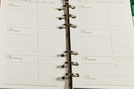 Close up image of black note book organizer against white backgroundの写真素材