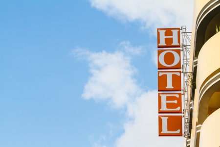 hotel sign  with blue sky の写真素材