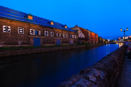 OTARU, JAPAN - August 15: Warehouses along the famed canal August 15, 2013 in Otaru, Japan. The historic structures date from early colonialization of Hokkaido in the early 1800's.のeditorial素材