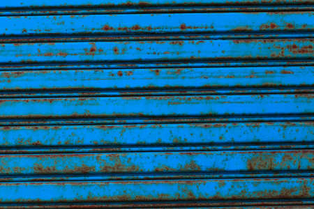 rusty steel door texture backgroundの写真素材