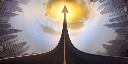 A road turning into an arrow rising upward on circle of city skyline background, symbolizing the direction to success in the future as a symbol of business vision.の写真素材
