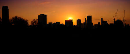 Skyscrapers buildings in the city on sunset background.の写真素材