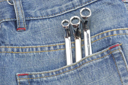 Wrenches in jeans pocket の写真素材