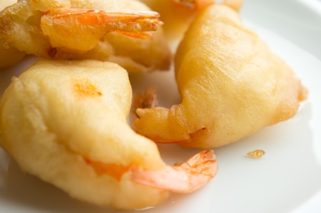 Closeup of shrimp tempura on diskの写真素材