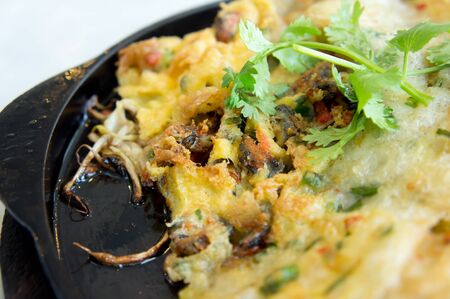 Crispy pan fried of green musselの写真素材