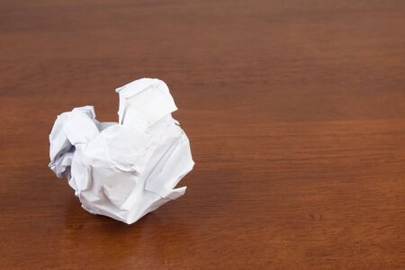 crumpled paper on table closeupの写真素材