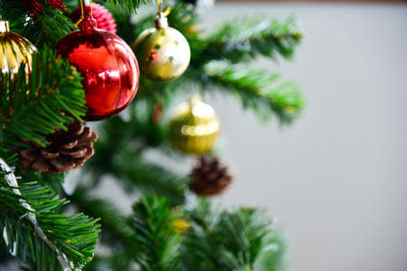 Close up red ball and gold ball and toys for decorating the christmas.
