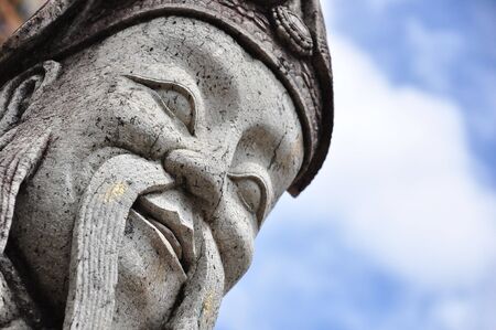 Chinese rock giant at Wat Pho, Bangkok, Thailandの写真素材