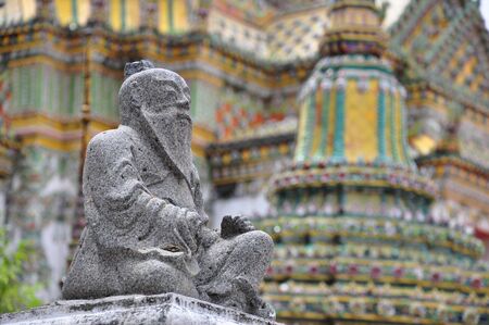  Chinese statue and Chedi in Wat Pho, Bangkok, Thailand の写真素材