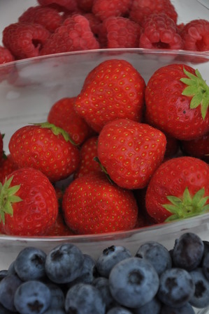 Blueberries, strawberries and raspberriesの写真素材