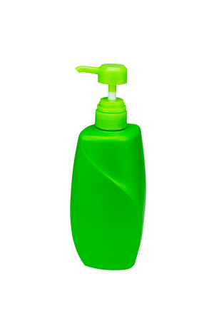 Yellow green pump bottle isolated on whiteの写真素材