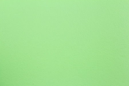 rough texture of the green wall backgroundの写真素材