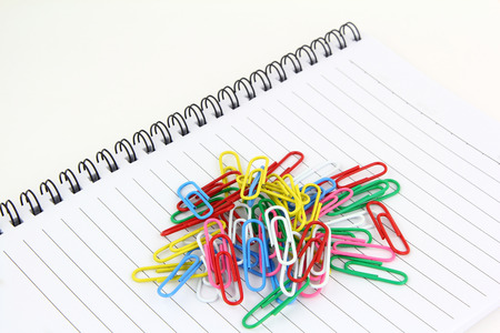 Clip on Paper note book  on white background.の写真素材