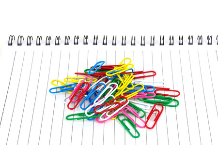 Clip on Paper note book  on white background.の写真素材